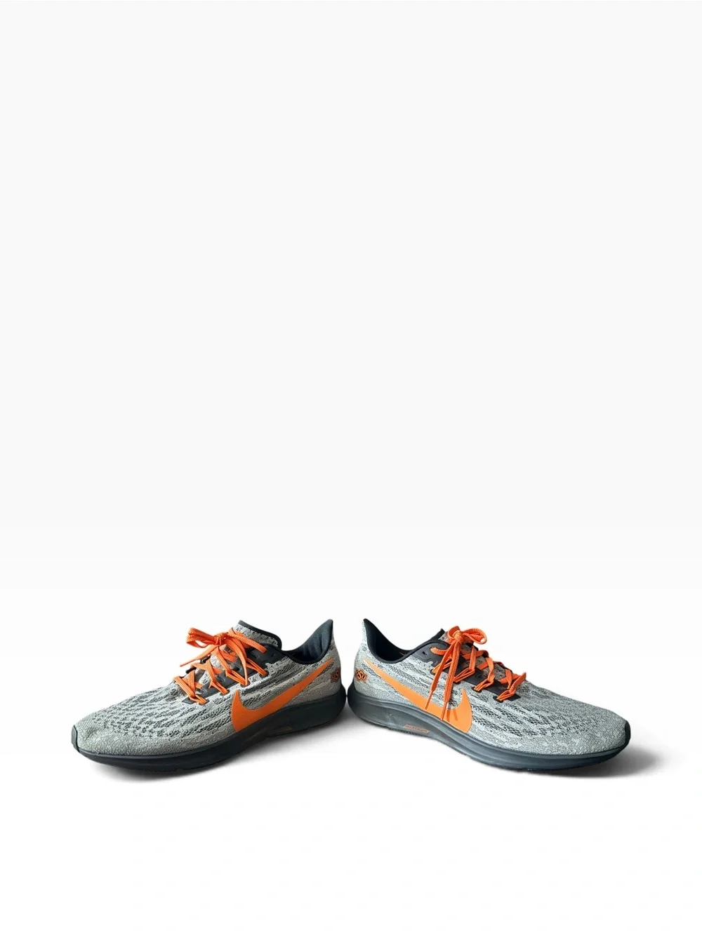 Nike Men’s Gray Running Sneakers with Orange Accents